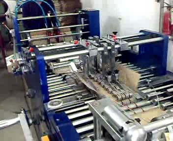 伊寧國(guó)標(biāo)品質(zhì)塑料制品 手機(jī)貼膜紙卡、紙袋與包裝盒制造機(jī)器一站式解決方案